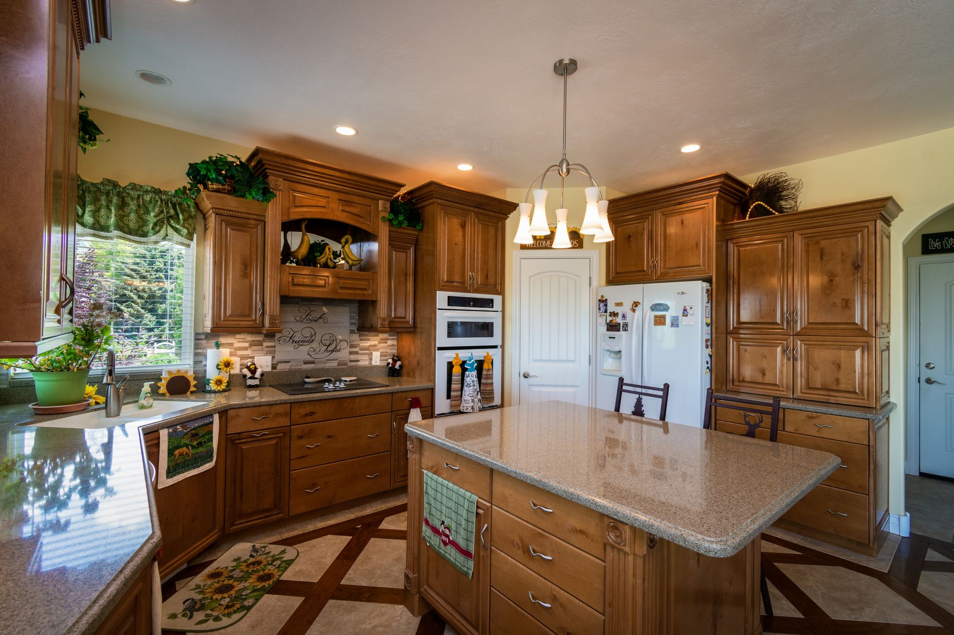 Warm, inviting kitchen interior with wooden cabinets and modern appliances in Carlsbad, CA